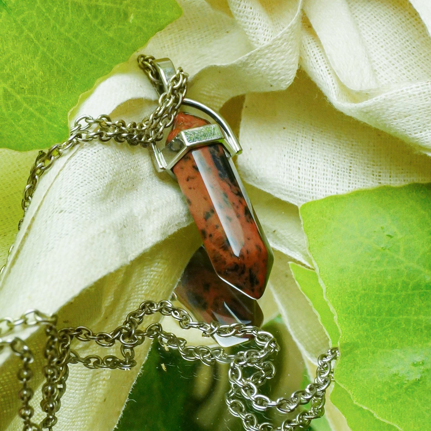 MantraMani® Mahogany Crystal Point Pendant