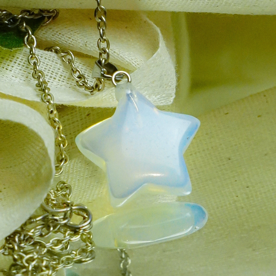 MantraMani® Opalite Crystal Star Pendant