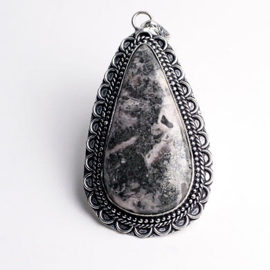 MantraMani® Rhodochrosite Crystal Pendant