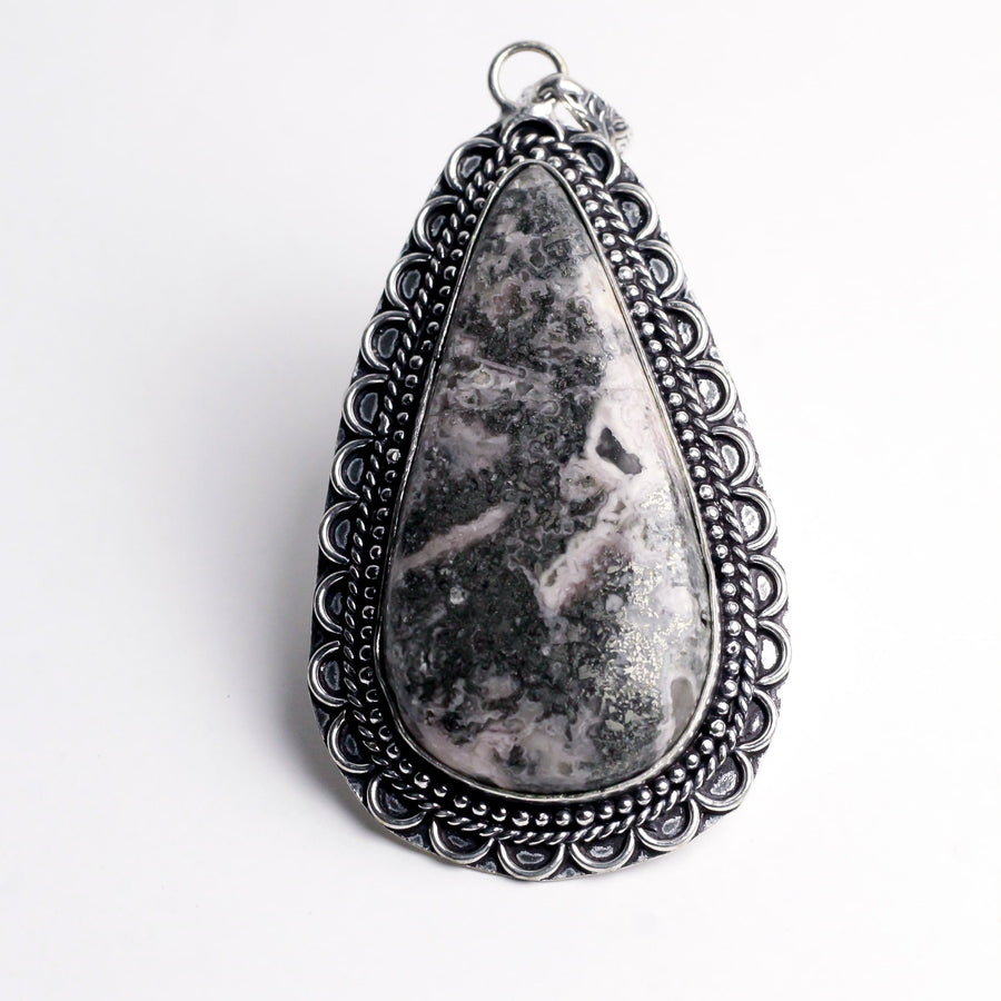 MantraMani® Rhodochrosite Crystal Pendant