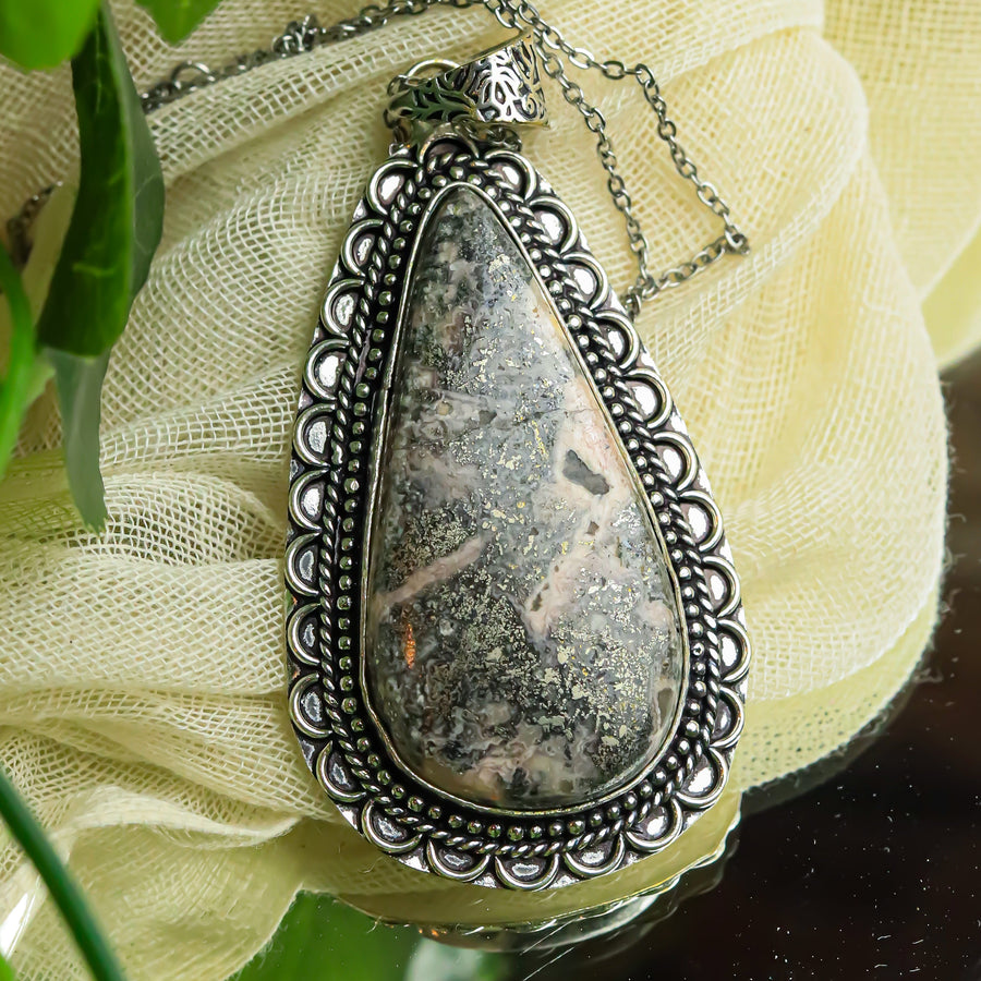 MantraMani® Rhodochrosite Crystal Pendant