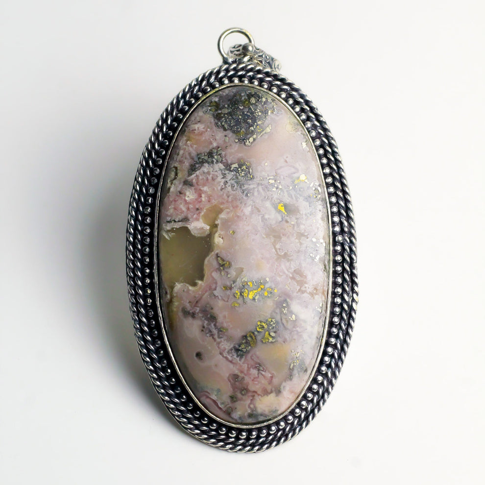 MantraMani® Rhodochrosite Crystal Pendant